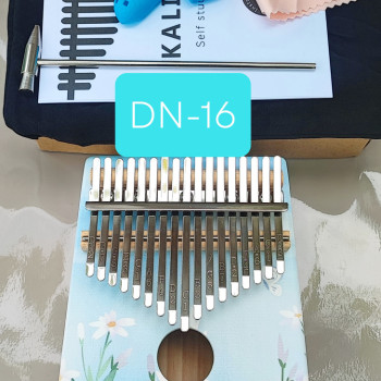 Калімба на 17 язичків (нот), з натурального дерева. З молоточком, чохлом. Біла