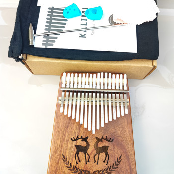 Калімба на 17 язичків (нот) з натурального дерева. З молоточком, чохлом. Коричнева