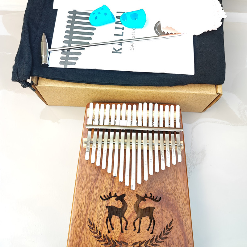 Калімба на 17 язичків (нот) з натурального дерева. З молоточком, чохлом. Коричнева